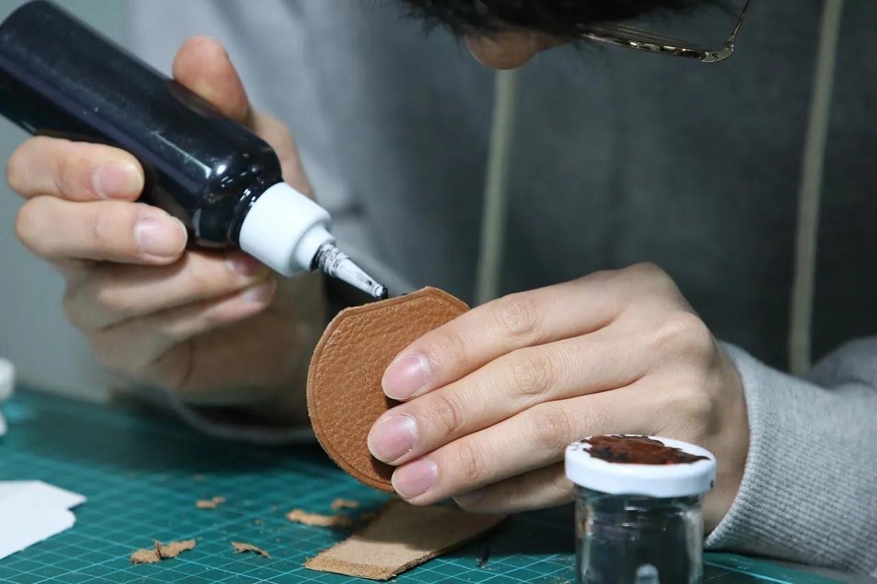 Best Things to Sell on Etsy Man Gluing Leather