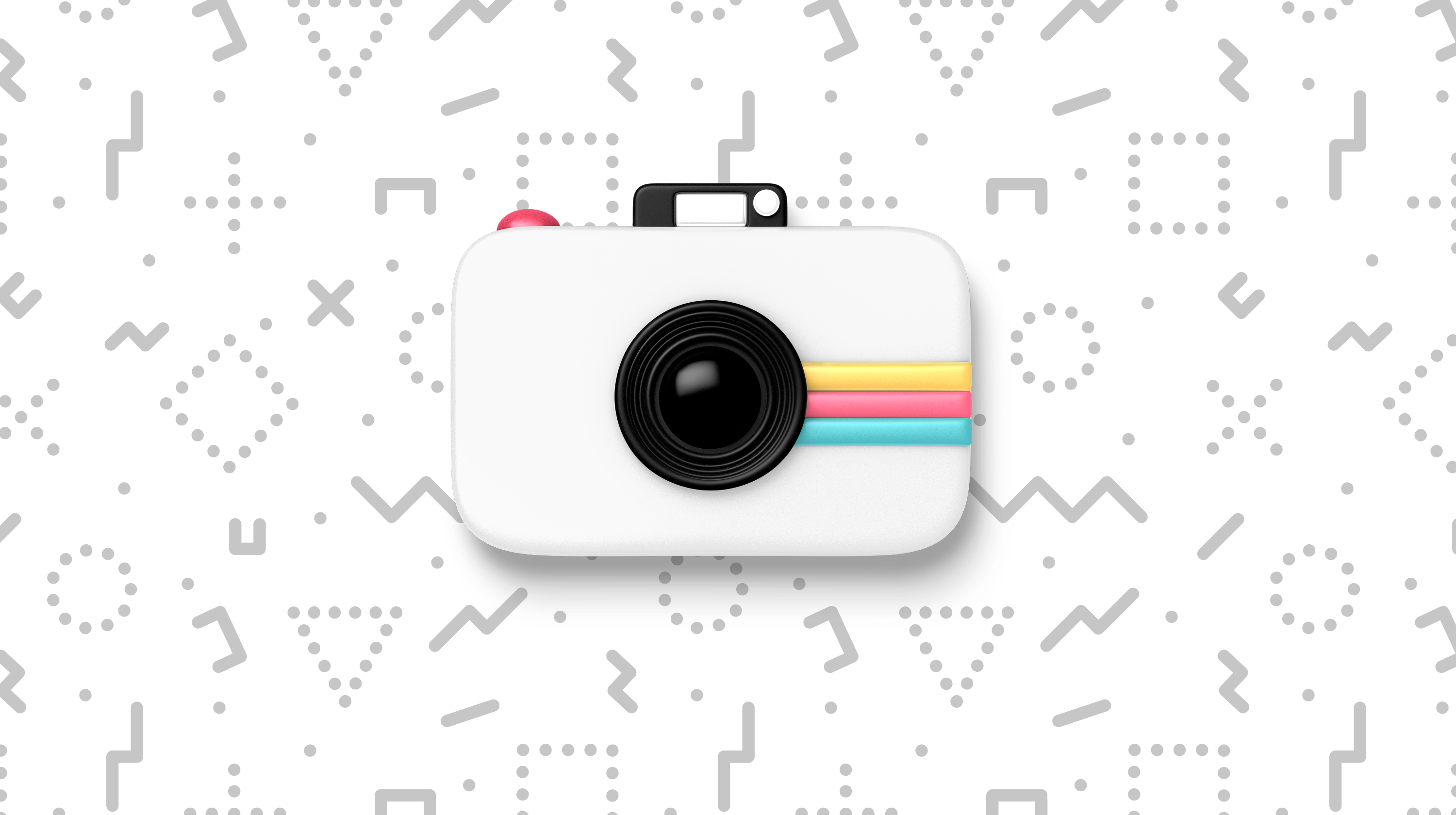 Retro camera on top of patterned background]