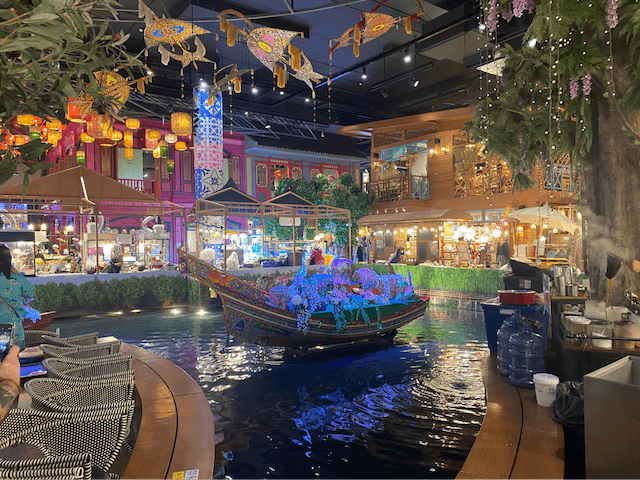 Indoor scenery inside the ICONSIAM with elaborate floral decorations
