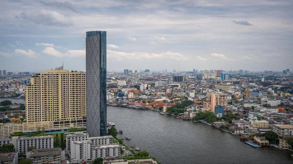 Landscape image showing buildings and river in Bangkok city
