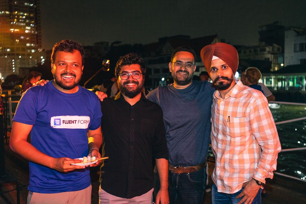 WordCamp Asia people at the GoDaddy boat party smiling