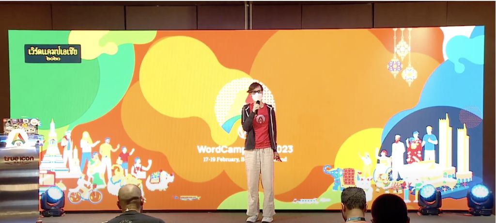 Mike Schroder emcees for WordCamp Asia 2023