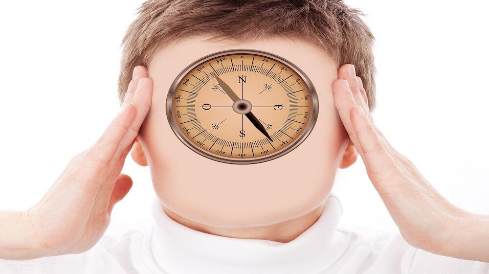 Man with compass on his face