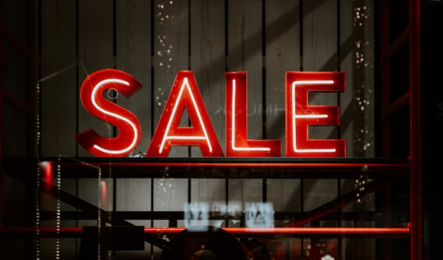 Neon “Sale” sign in a store window