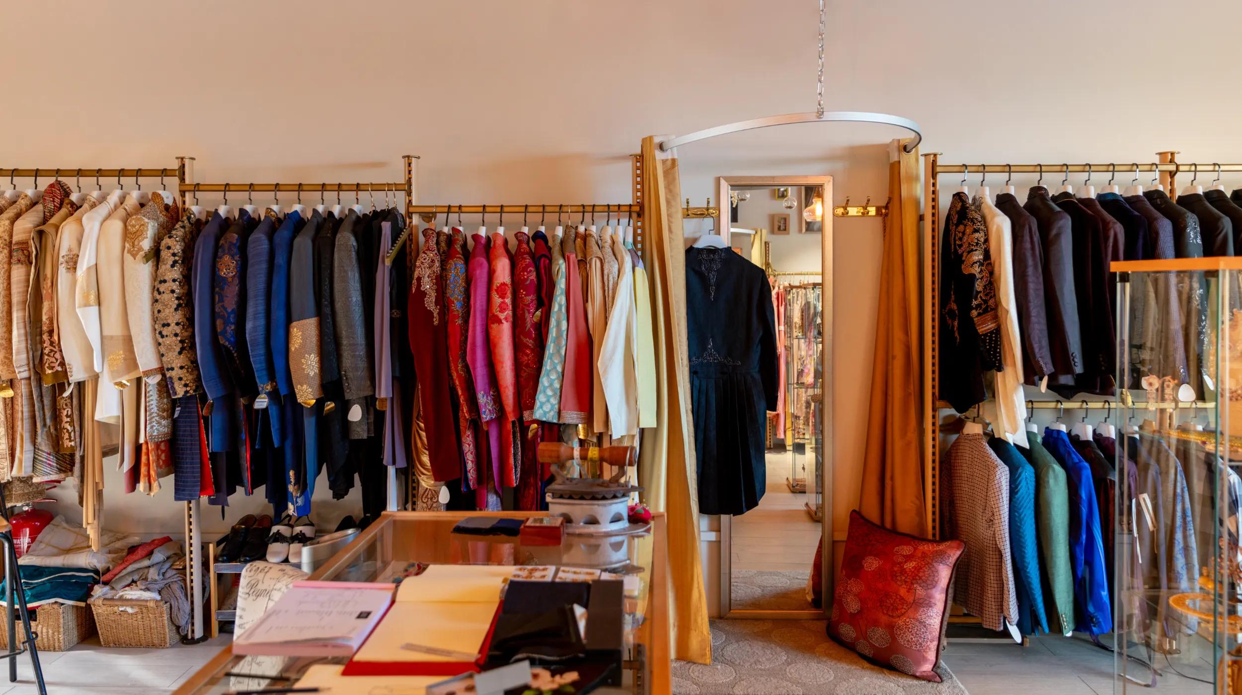Boutique racks filled with colorful traditional clothing, used to illustrate a step-by-step guide article on how to sell on Facebook Marketplace, including 20 essential tips to boost sales and attract more buyers.