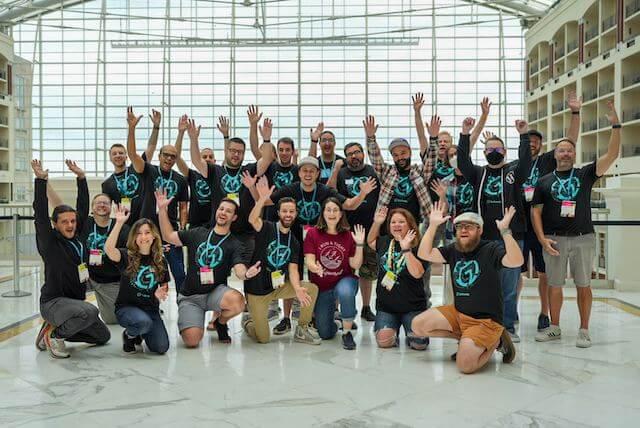 GoDaddy team posing for a picture at WCUS 2023(1)