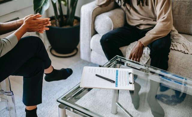 Two people chatting in a therapy session