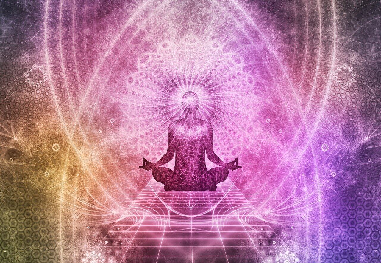 Colorful graphic showing a human figure meditating