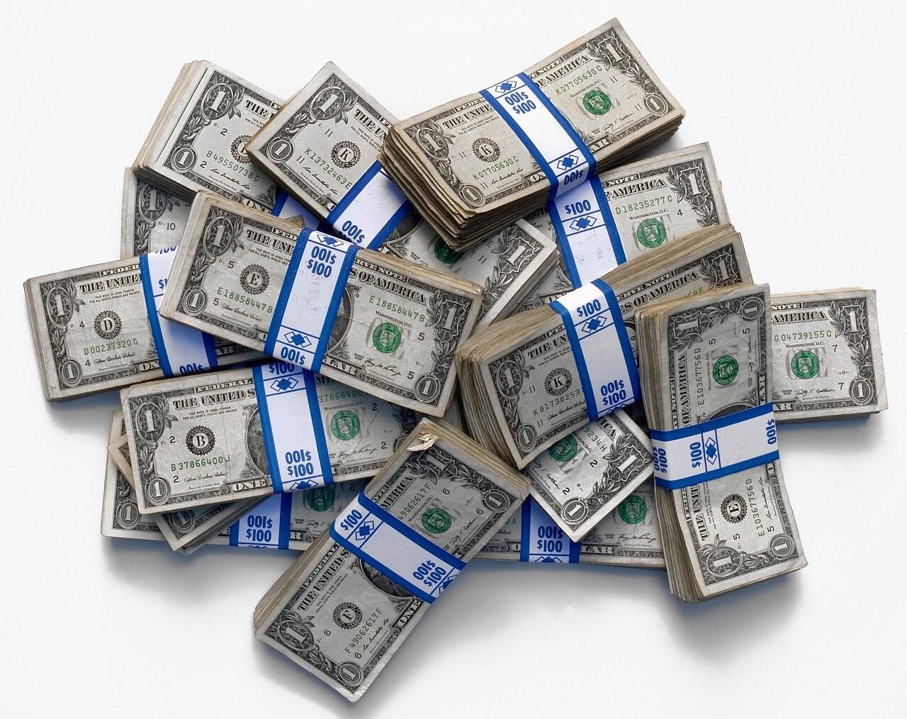 a pile of cash in bundles