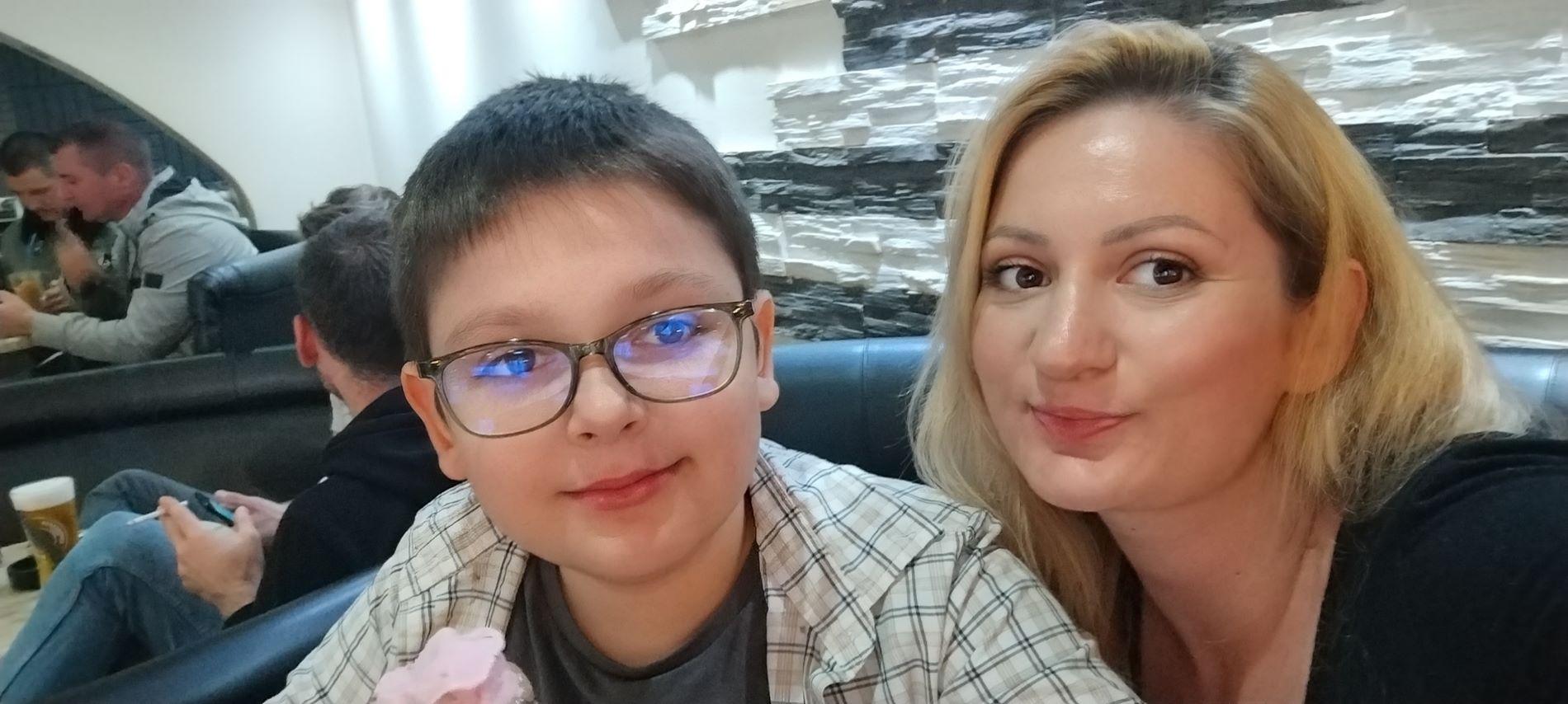 a man and woman taking a selfie