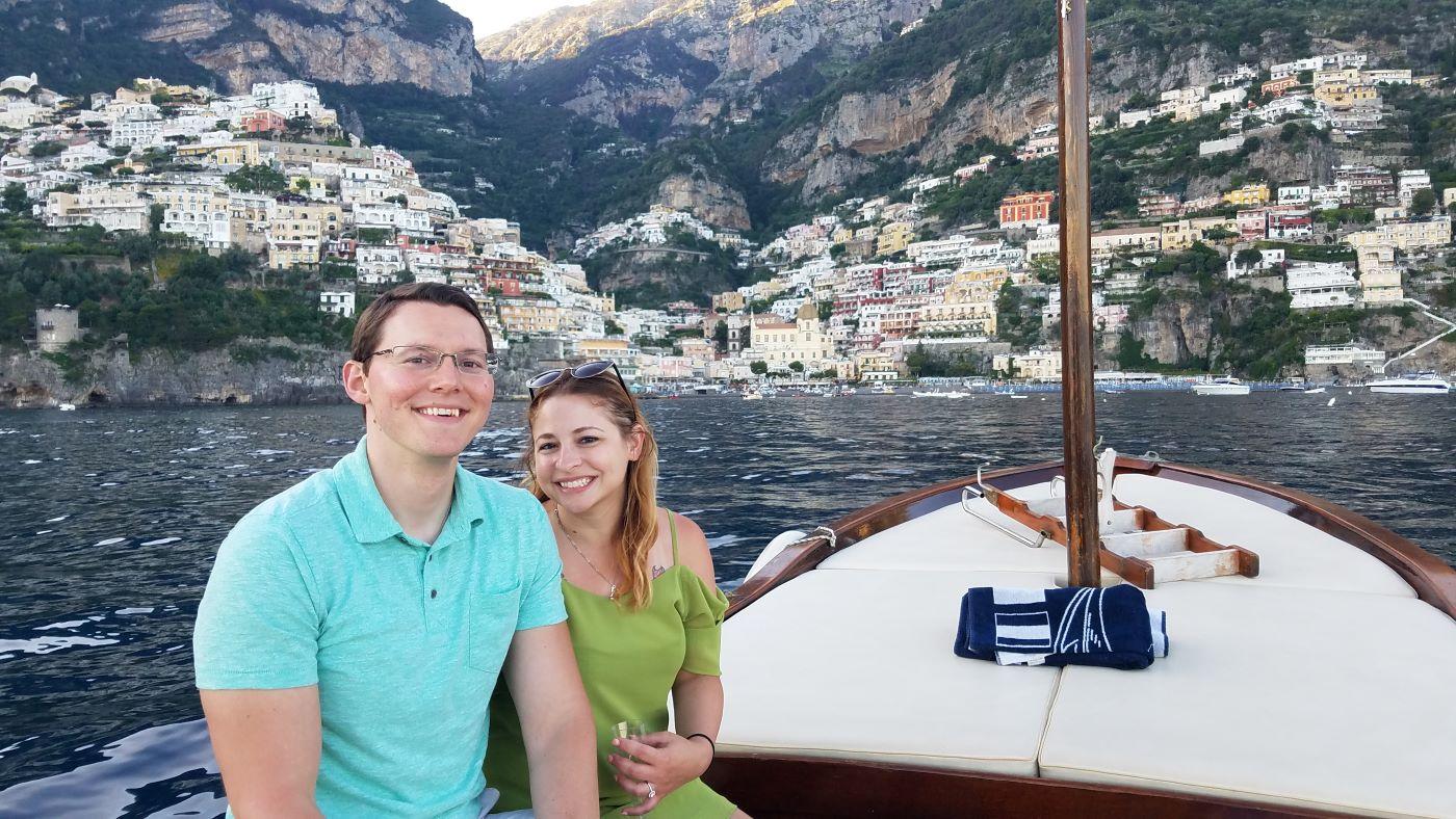 a man and woman on a boat