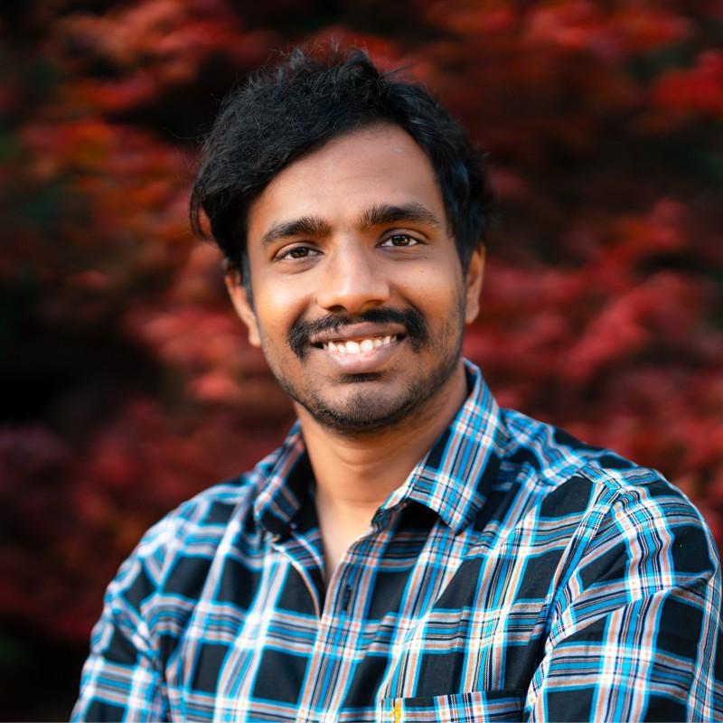 a man smiling for the camera
