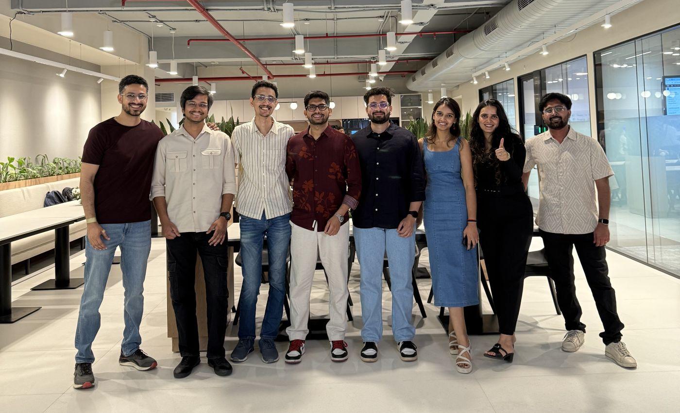 a group of people posing for a photo