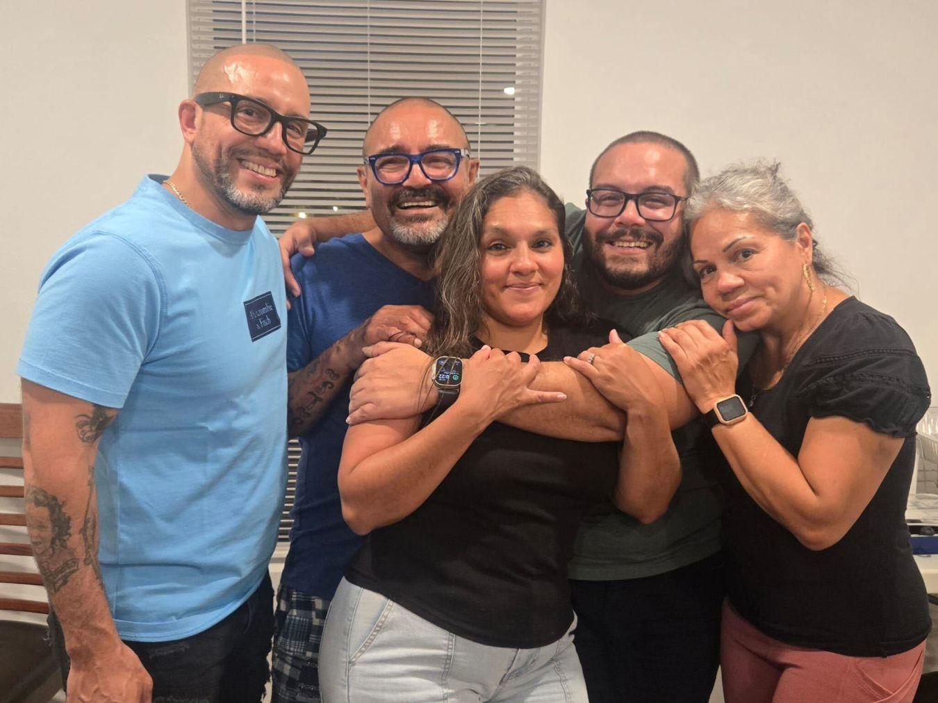 a group of people posing for a photo