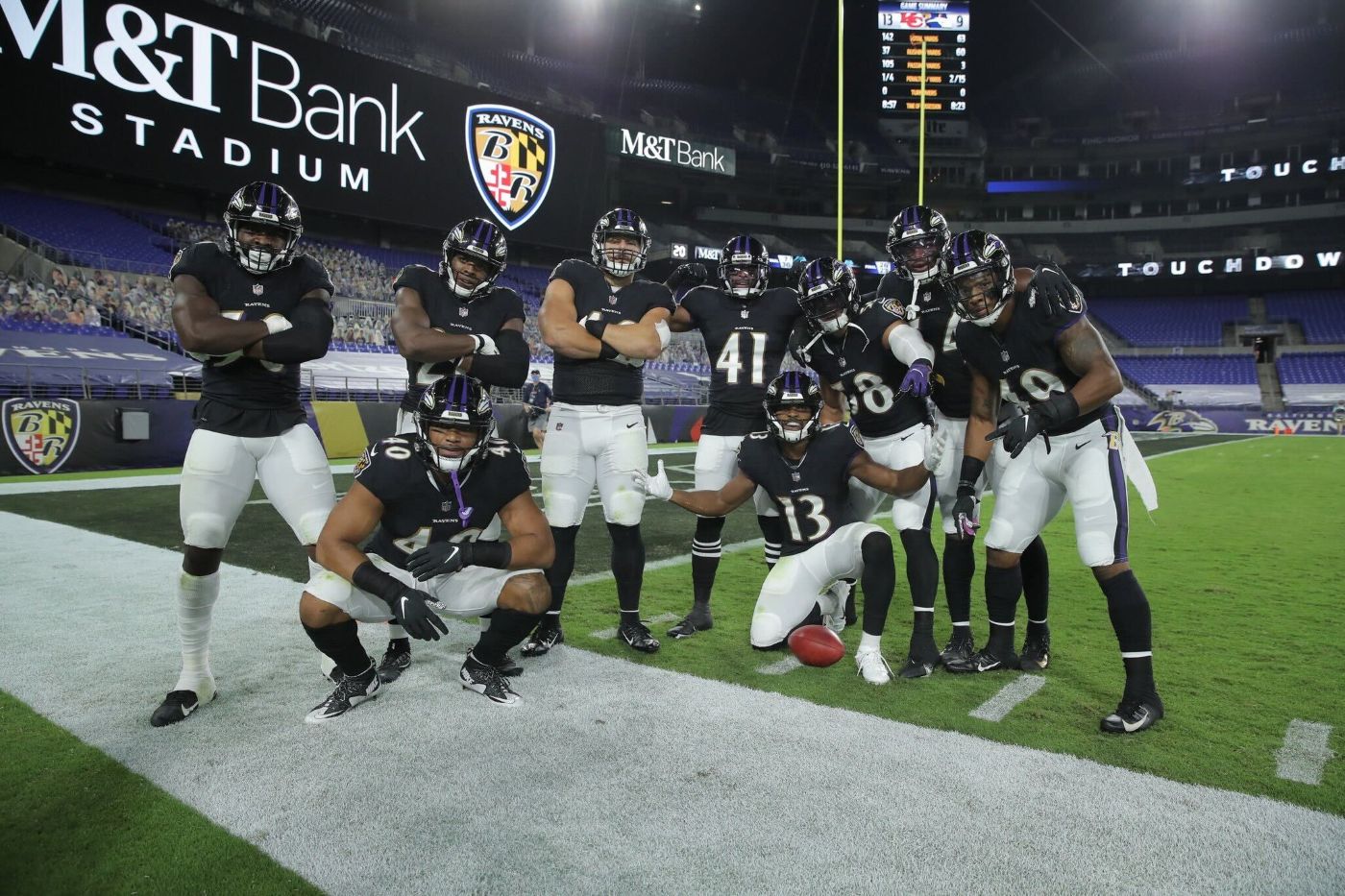 a group of football players on a field