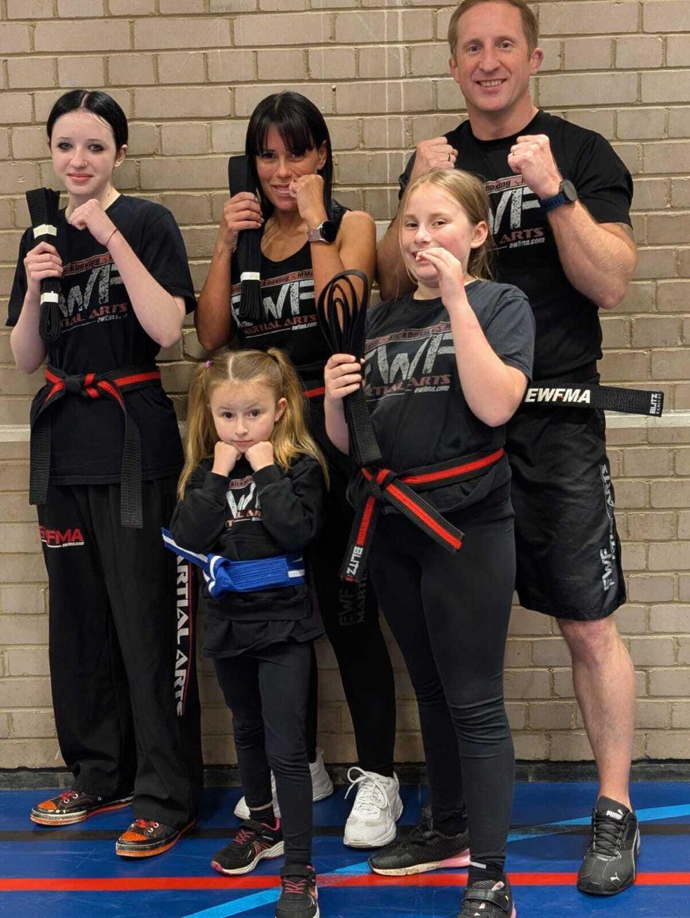 a group of people posing for a photo