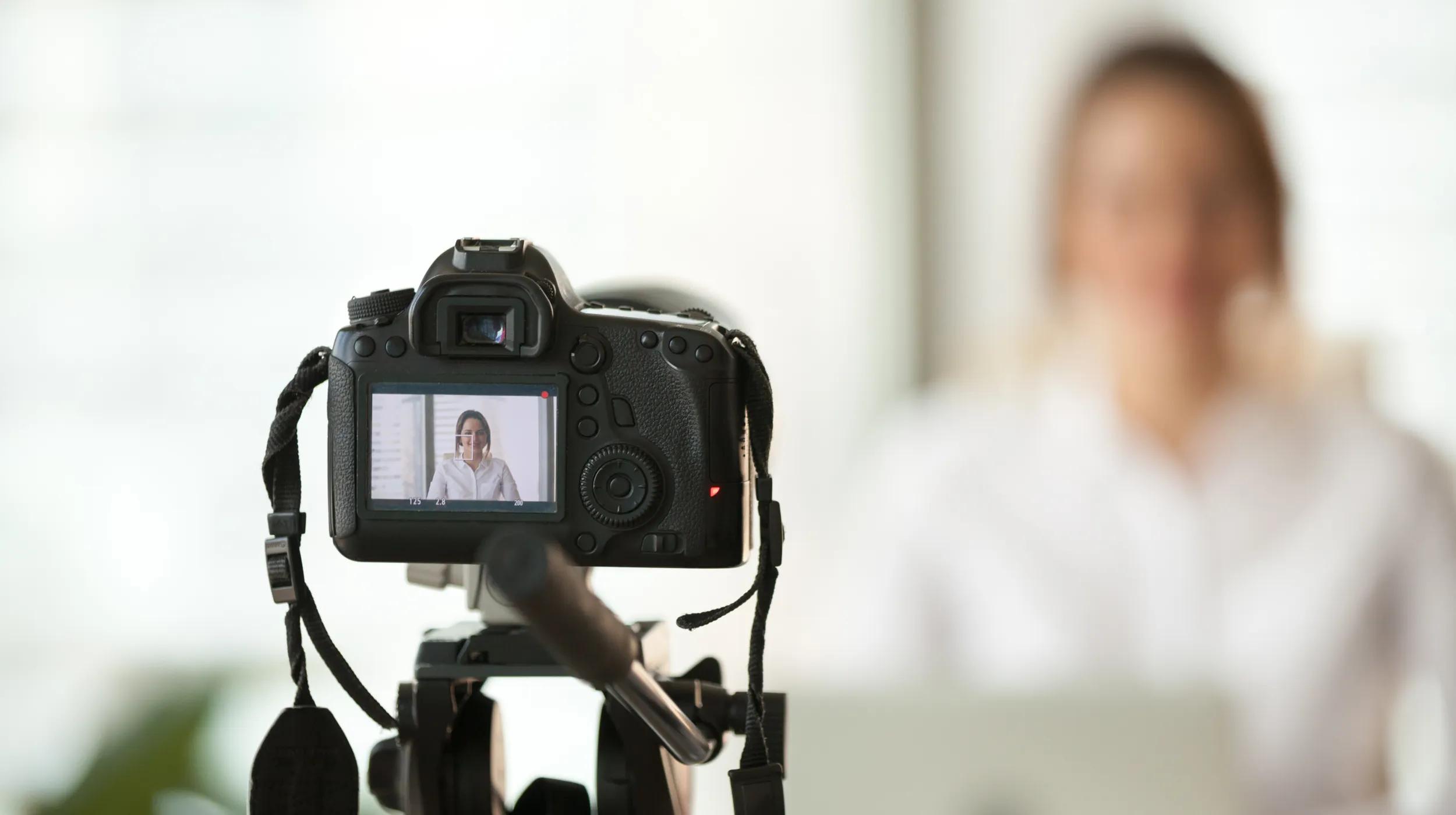 a person holding a camera