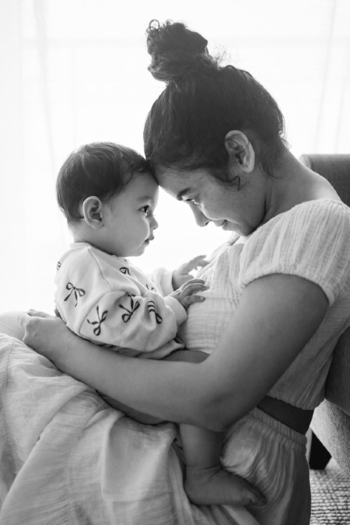 a person holding a baby