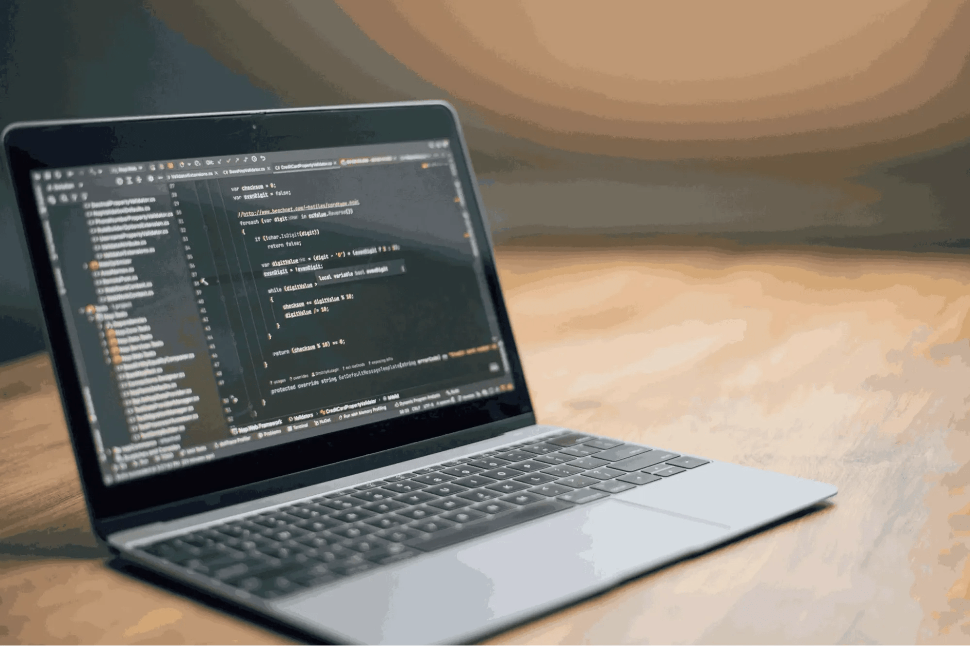 An Open Laptop Displays Lines of Code