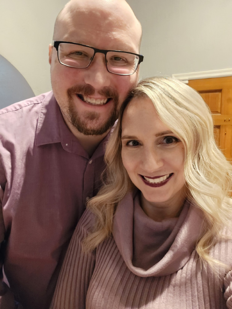 a man and woman smiling