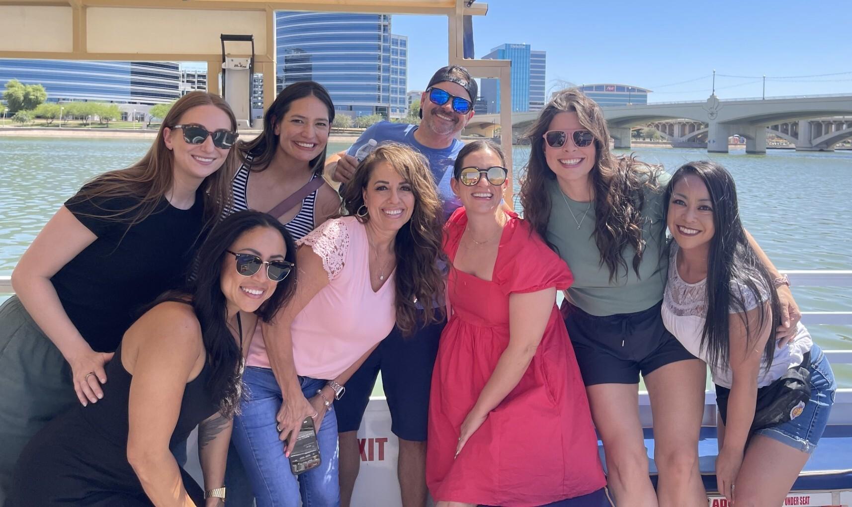 a group of people posing for a photo