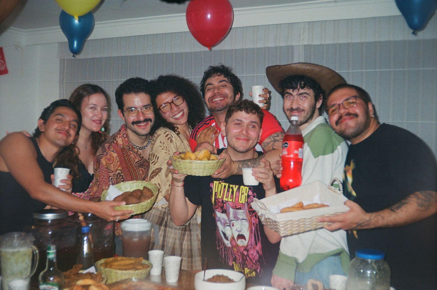a group of people holding food