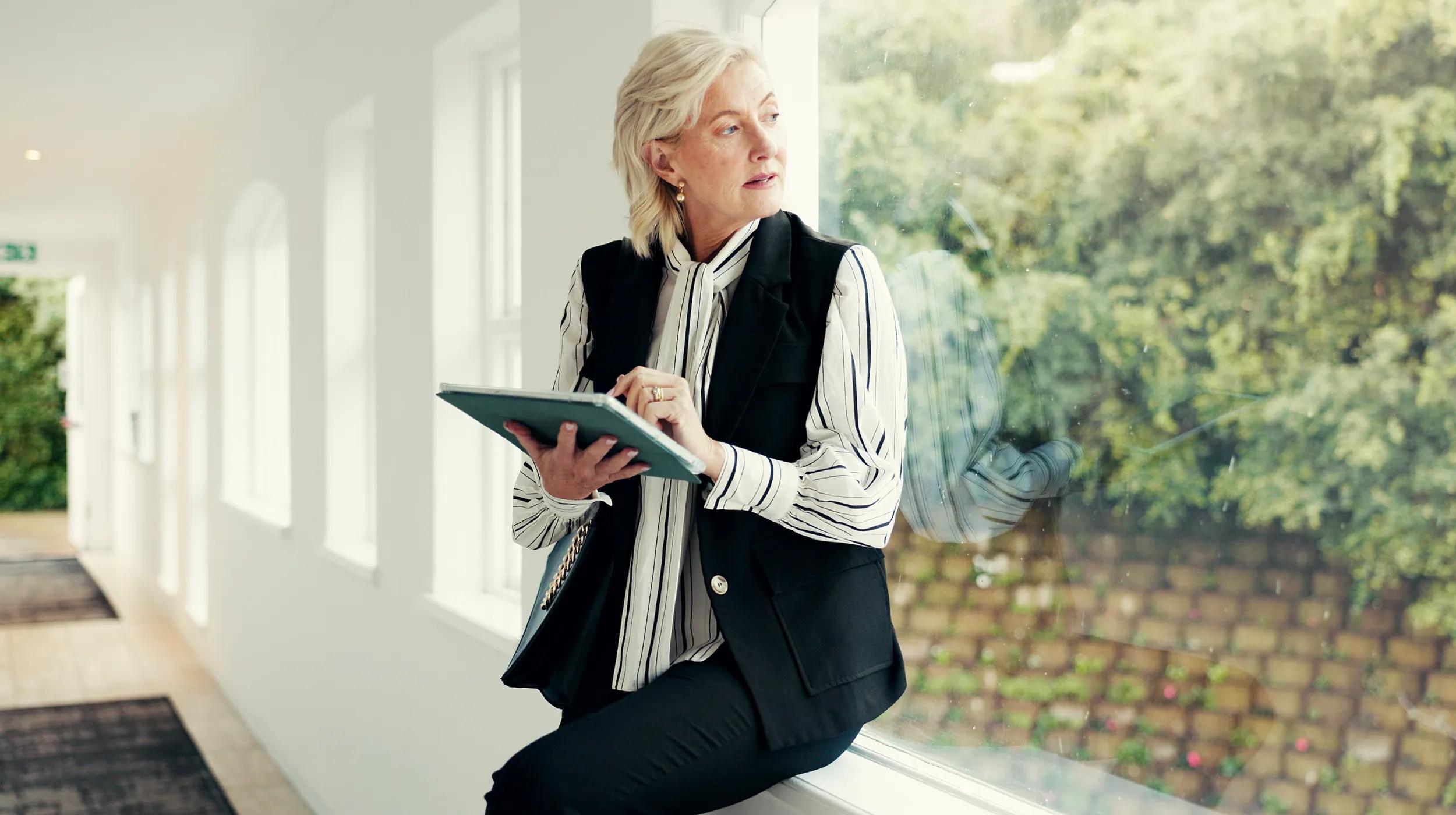 a woman holding a book