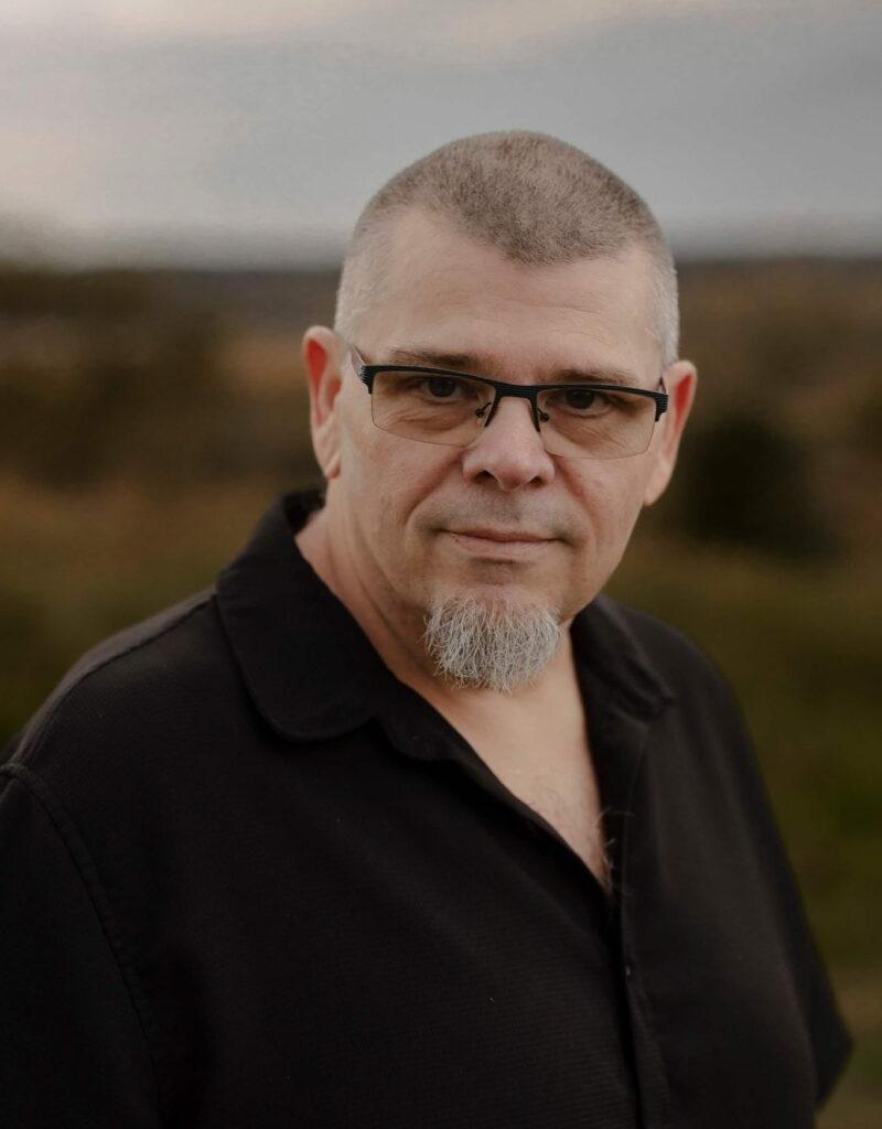 Joey Crowell, the artist and creator behind Widow's Debt.