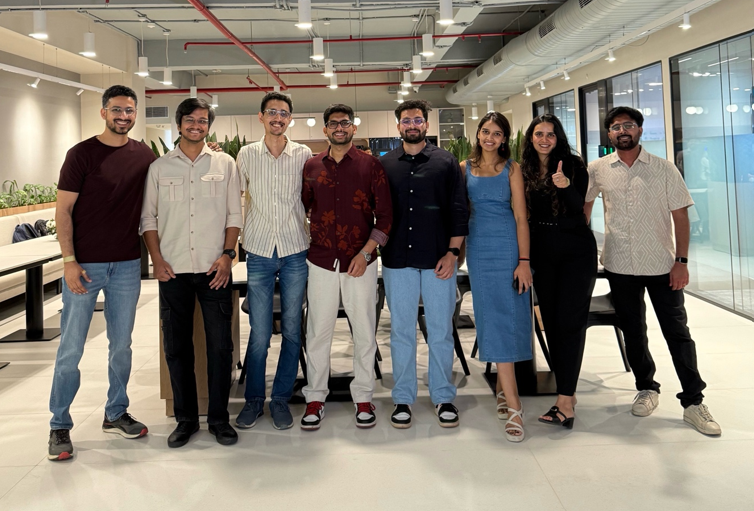 a group of people posing for a photo