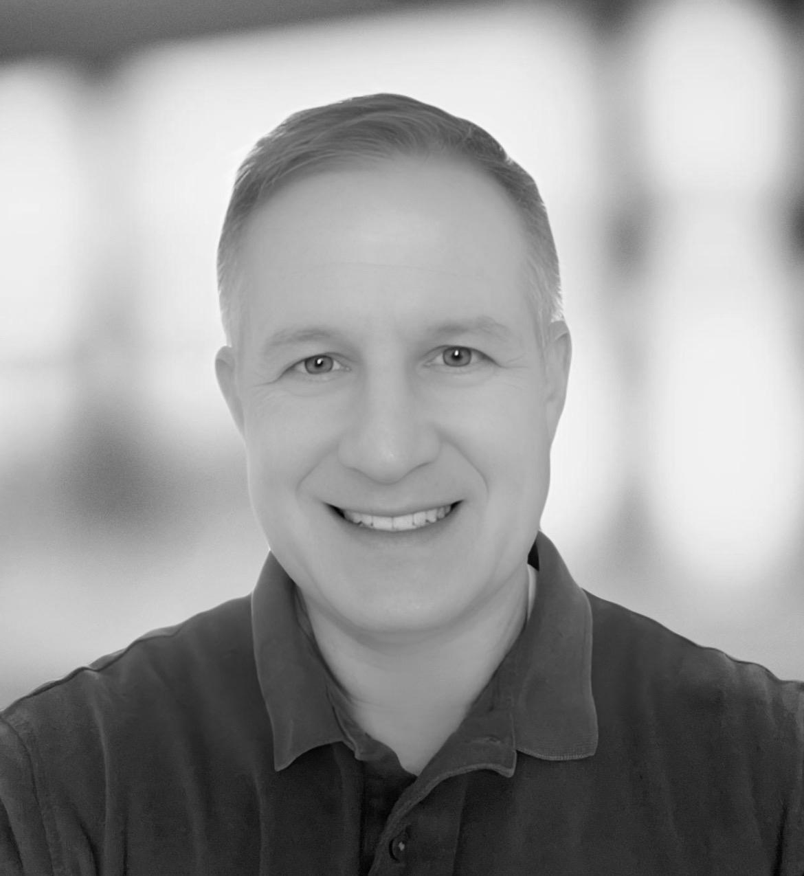 a man smiling for the camera