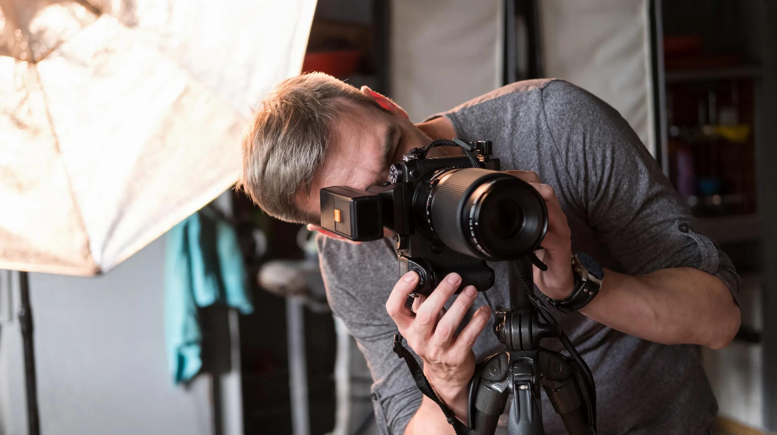 a man holding a camera