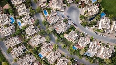 Aerial View of Buildings Illustrates Comparing Real Estate to Domain Names