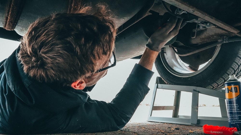 Mechanic Working On Vehicle Repairs