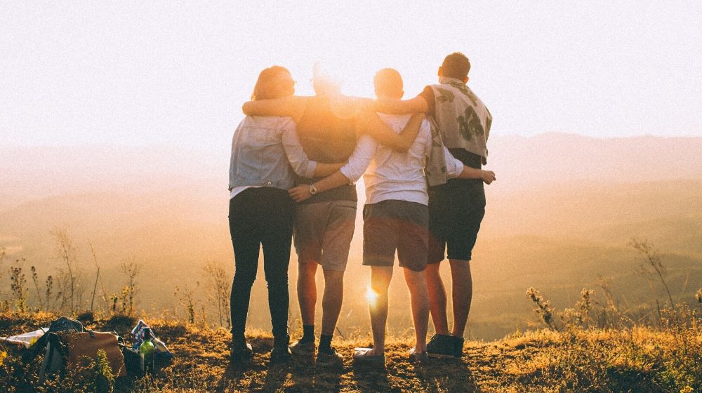 Best Project Management Software Team Standing In Sunlight