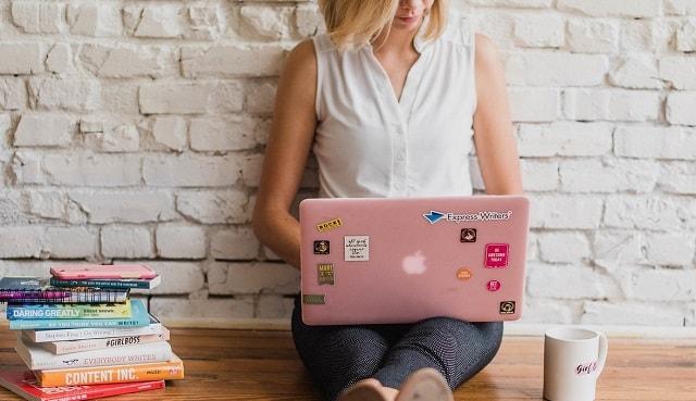 Blog SEO Woman Typing On Laptop