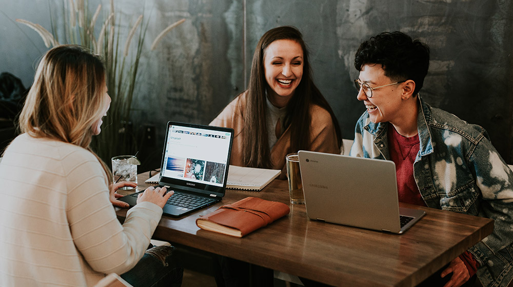 People Looking at Social Media on Computer