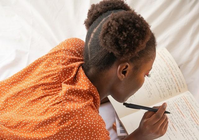 Build Confidence Woman Writing In Journal