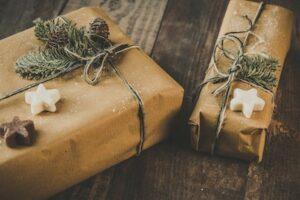 Holiday gifts wrapped in brown paper with stars