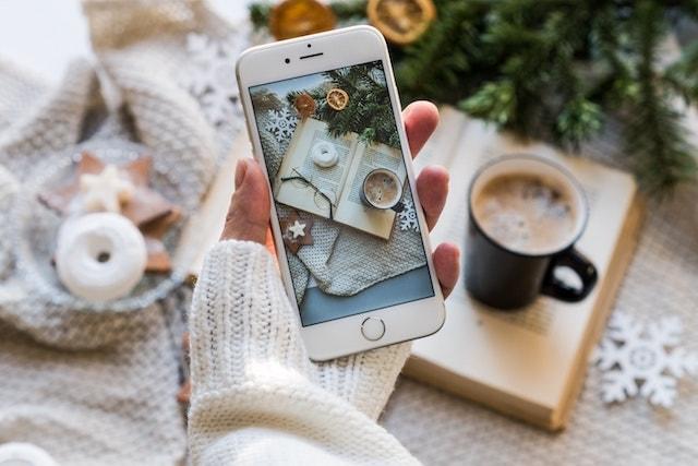 Taking a photo of coffee and pastries on iPhone