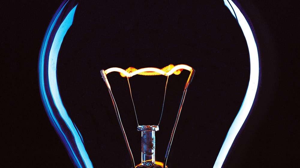 Closeup Lightbulb to Illustrate Domain Glossary Knowledge