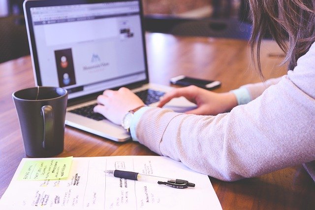 Create A Marketing Plan Woman Working On Laptop