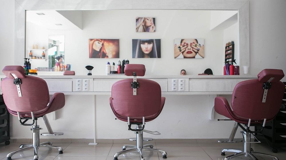 Three Empty Salon Chairs