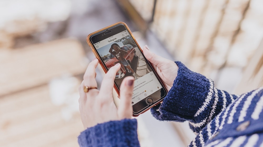 Woman Looking At Instagram