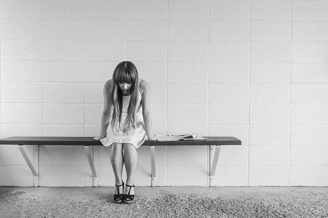 Sad Woman On Bench