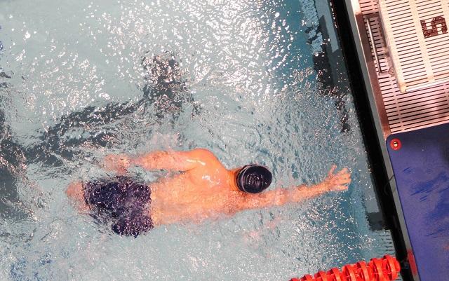 Swimmer Finishing A Race