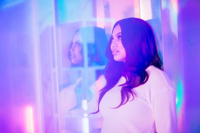 GoDaddy Ayesha Curry Side Profile Soft Purple Background