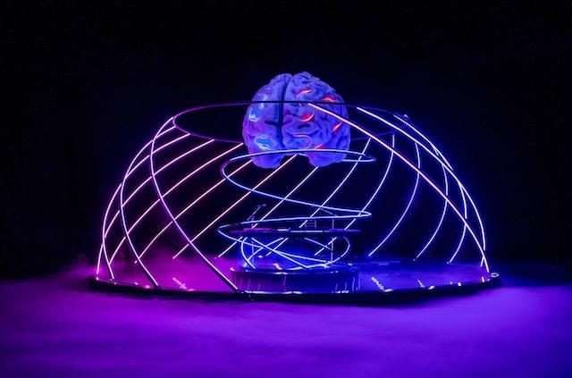 GoDaddy Elohim Stage Set Brain Over Cage