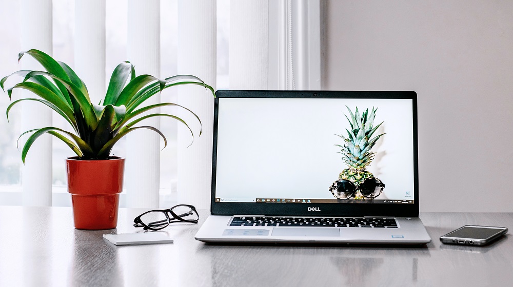 GoDaddy GoInfluencer Program Laptop On A Desk