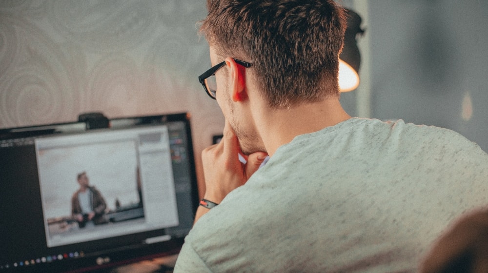 How To Design A Website Man At Desktop Computer