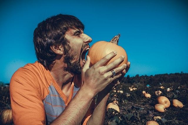 How To Sell A Website To A Client Man Biting Pumpkin